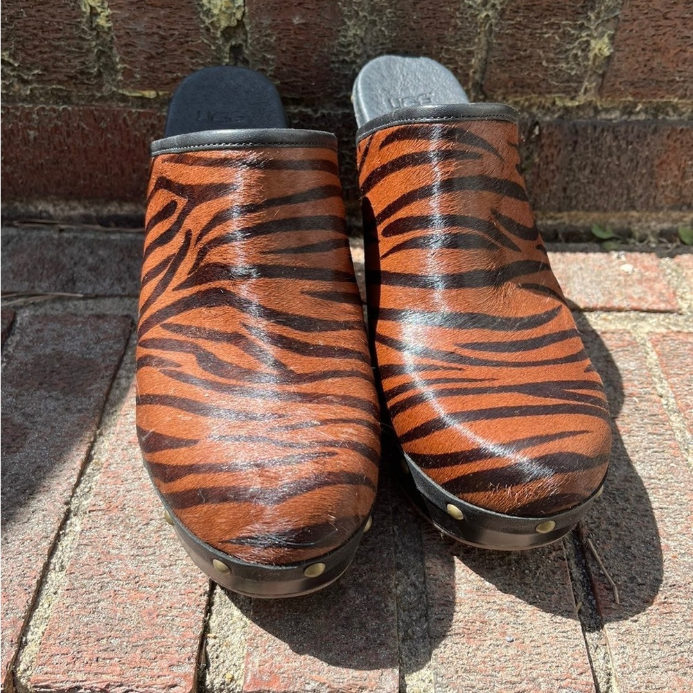 Ugg brand wooden clog half slip on platform with  fur and animal print